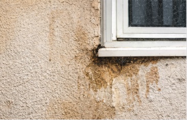 stucco-that-has-been-stained-damaged